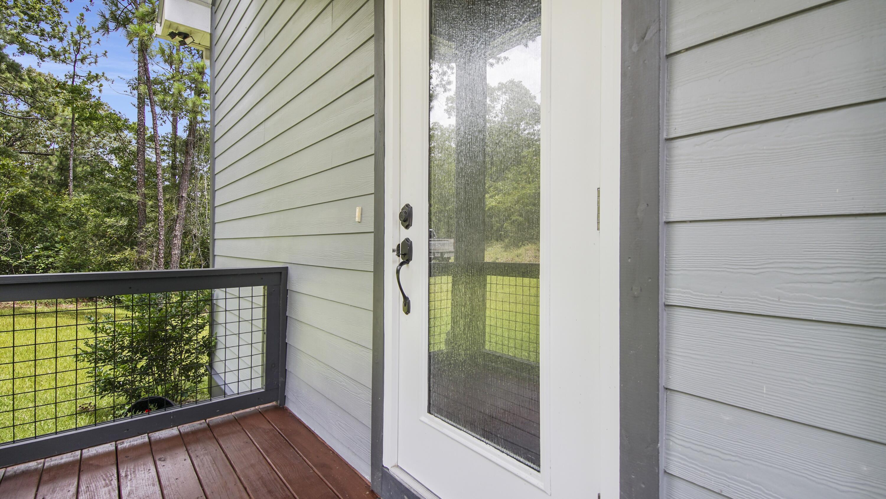 888 Spring Lake Road DeFuniak Springs, FL 32433 - Photo 54 of 75 a view of a balcony with wooden floor