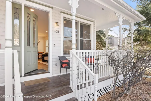 a view of a balcony with wooden floor