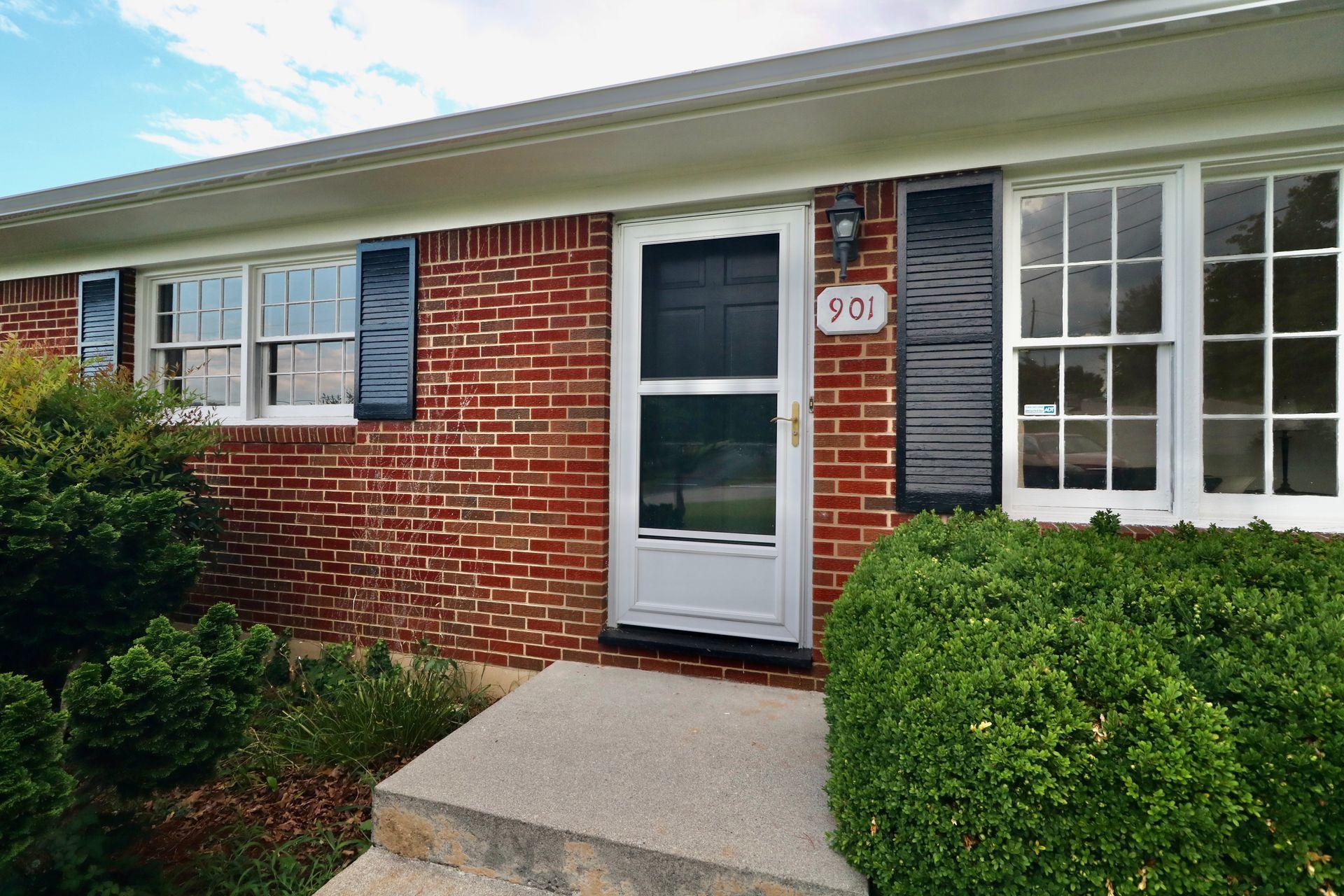 901 Olney Road Vinton, VA 24179 - Photo 11 of 42 a front view of a house with a yard