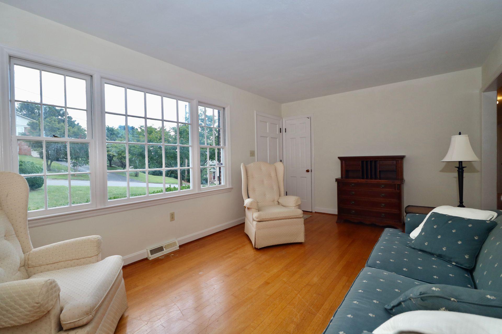 901 Olney Road Vinton, VA 24179 - Photo 13 of 42 a living room with furniture and a flat screen tv