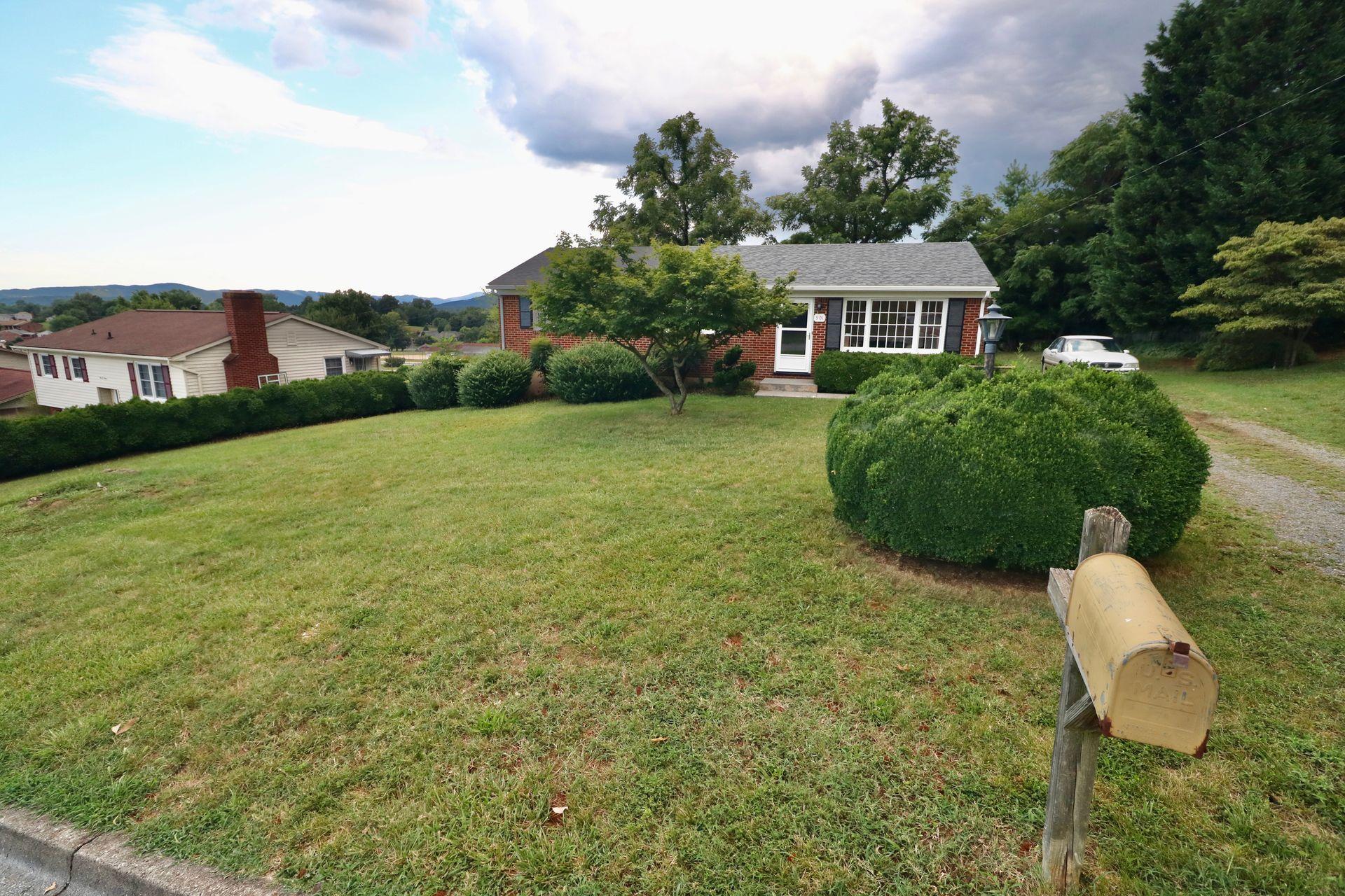 901 Olney Road Vinton, VA 24179 - Photo 7 of 42 a house view with a garden space