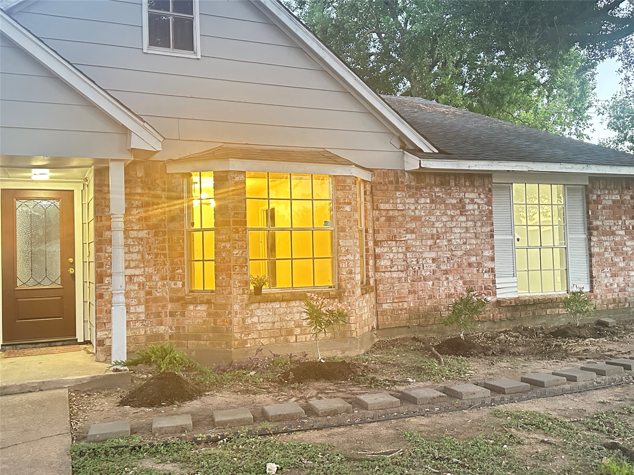 9631 Stockwell Street Houston, TX 77083 - Photo 1 of 23 a view of a porch