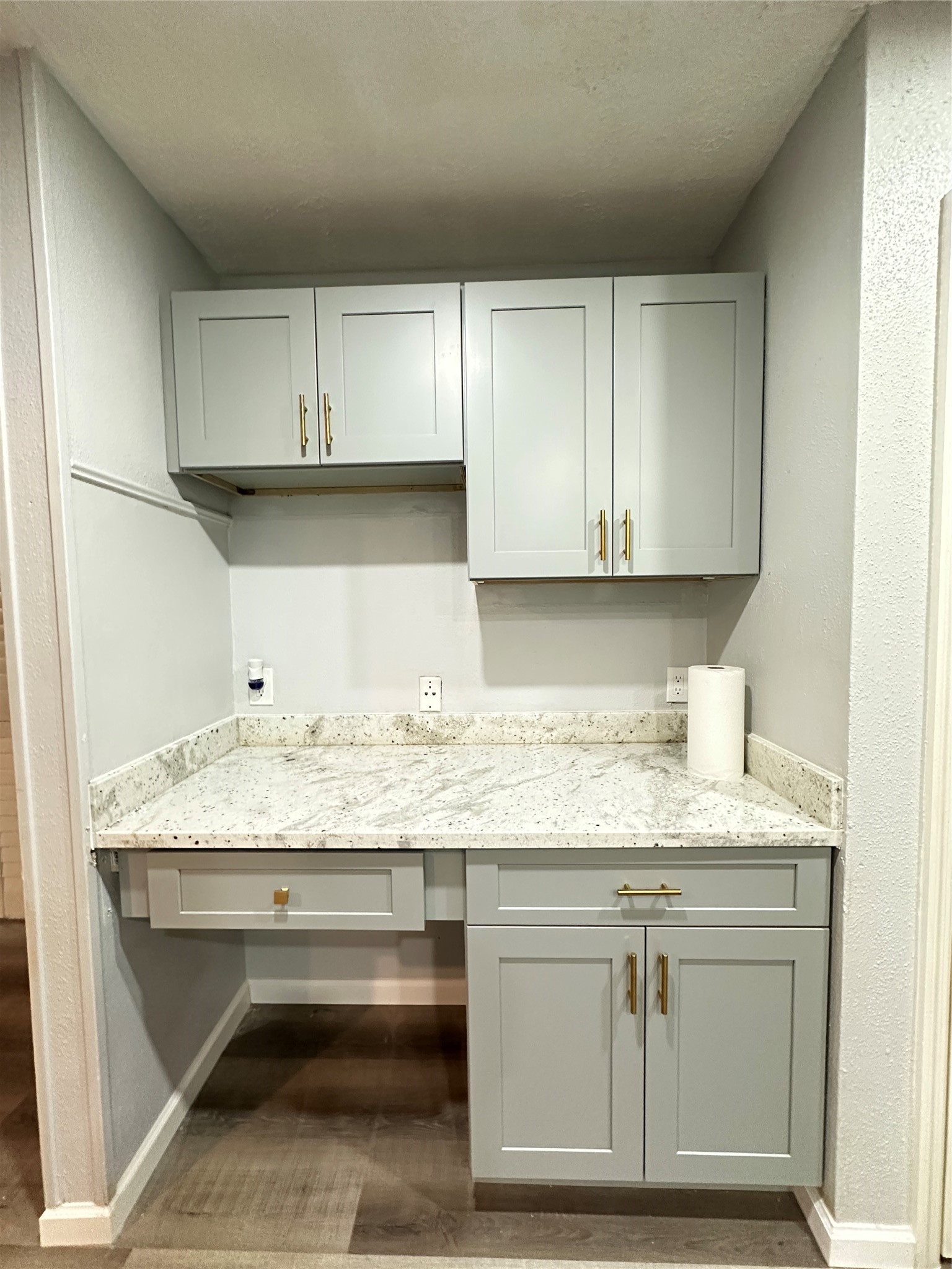 9631 Stockwell Street Houston, TX 77083 - Photo 12 of 23 a kitchen with granite countertop cabinets stainless steel appliances and a sink