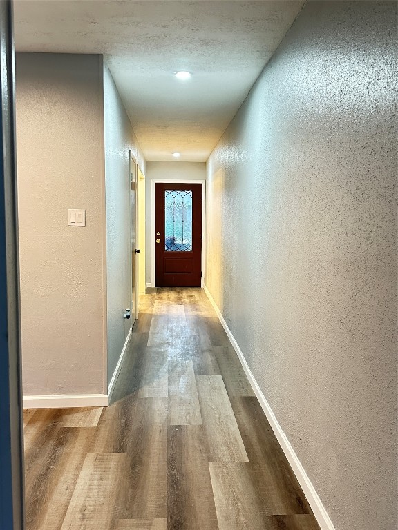 9631 Stockwell Street Houston, TX 77083 - Photo 3 of 23 a view of hallway with wooden floor