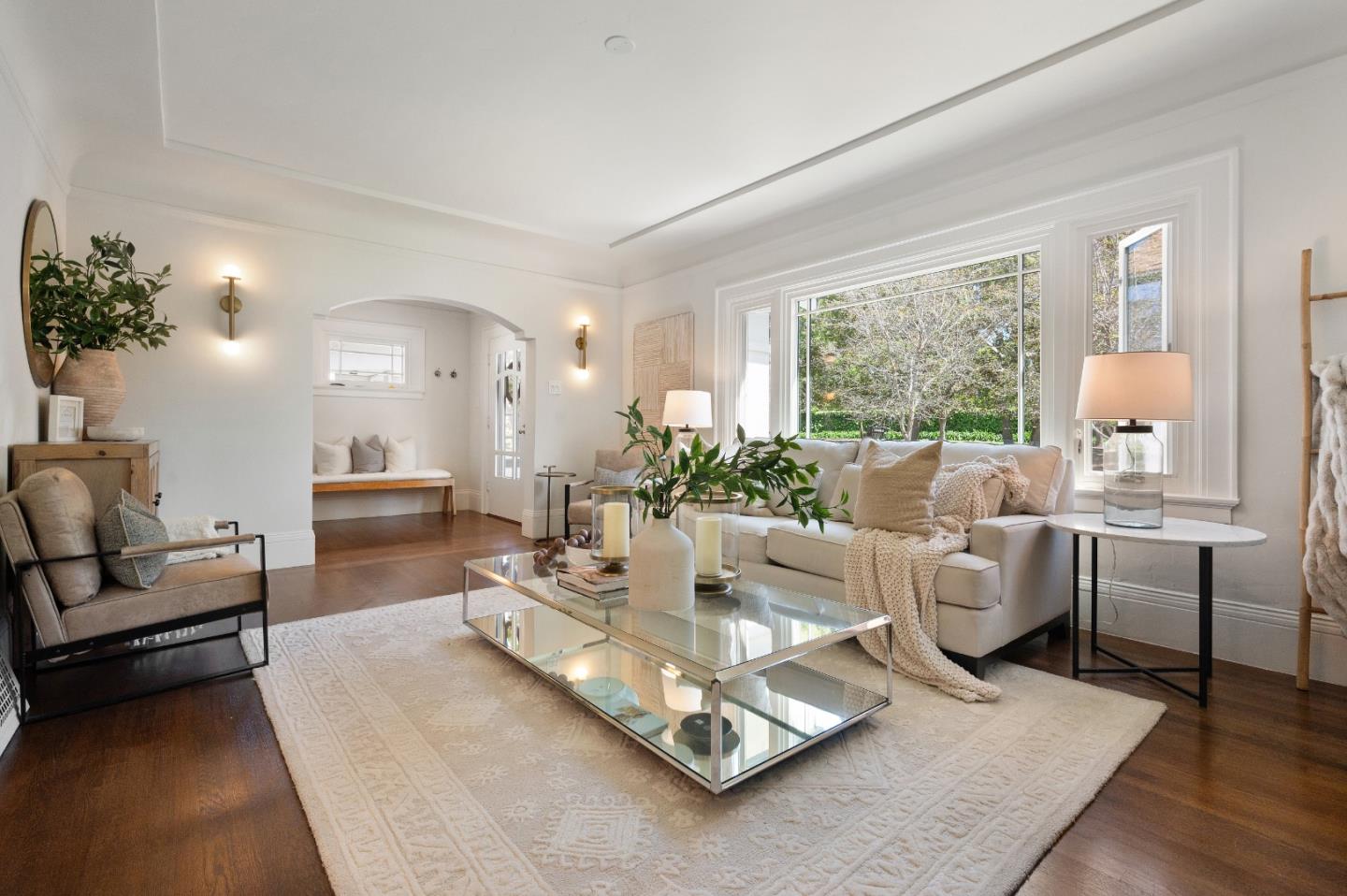 170 Warren Road San Mateo, CA 94401 - Photo 17 of 56 a living room with fireplace furniture and a large window