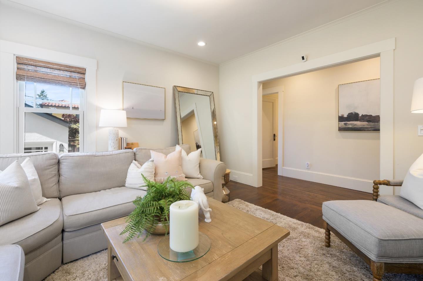170 Warren Road San Mateo, CA 94401 - Photo 34 of 56 a living room with furniture and a potted plant