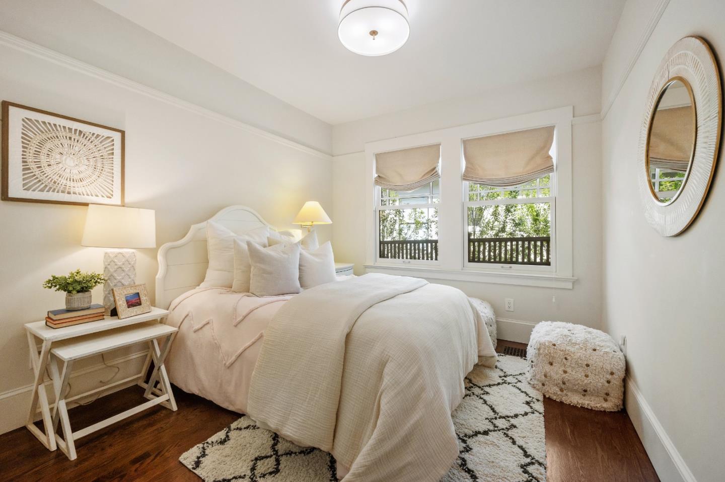 170 Warren Road San Mateo, CA 94401 - Photo 36 of 56 a bedroom with a bed and a window