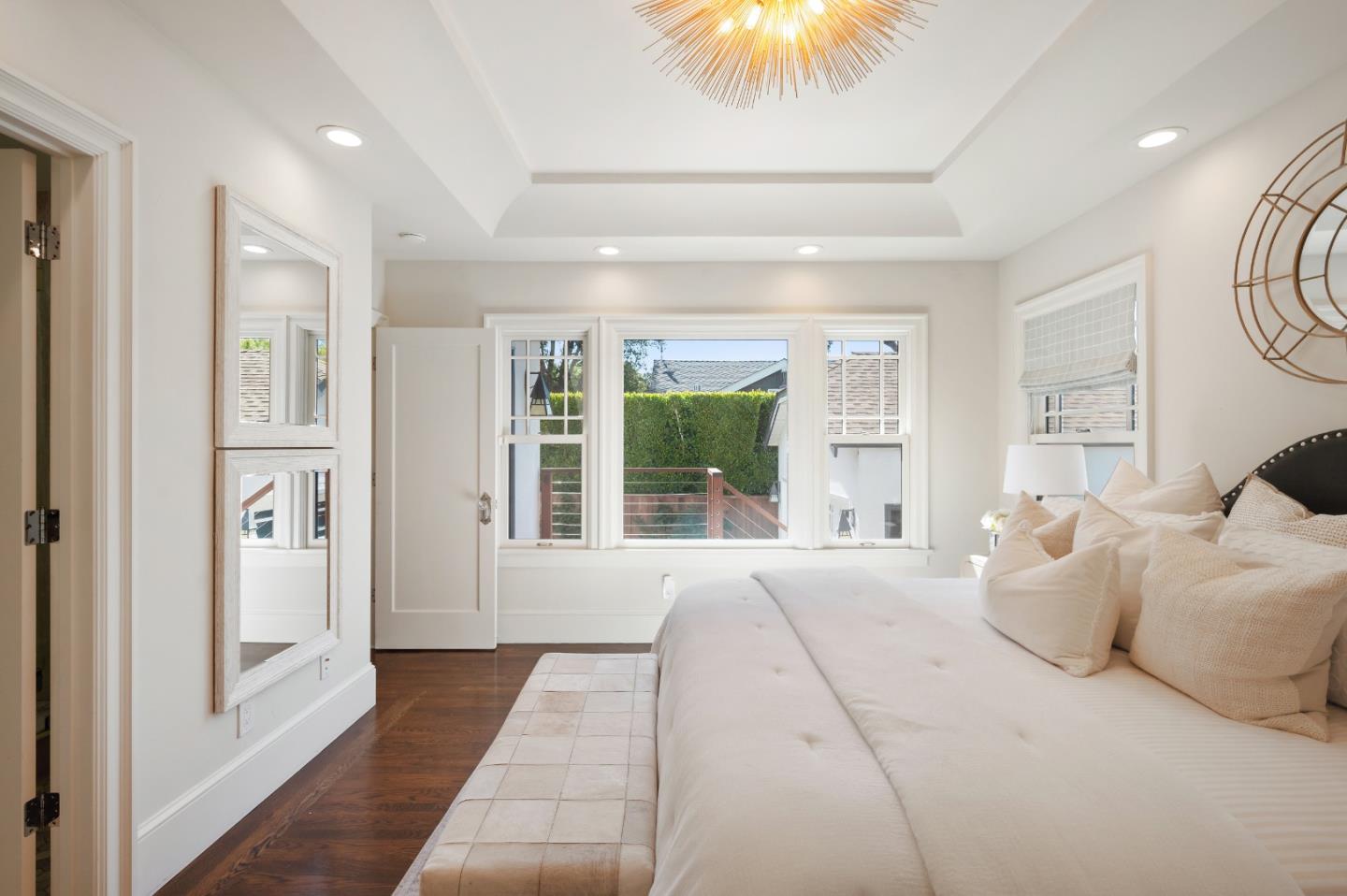 170 Warren Road San Mateo, CA 94401 - Photo 41 of 56 a bedroom with furniture and a large window