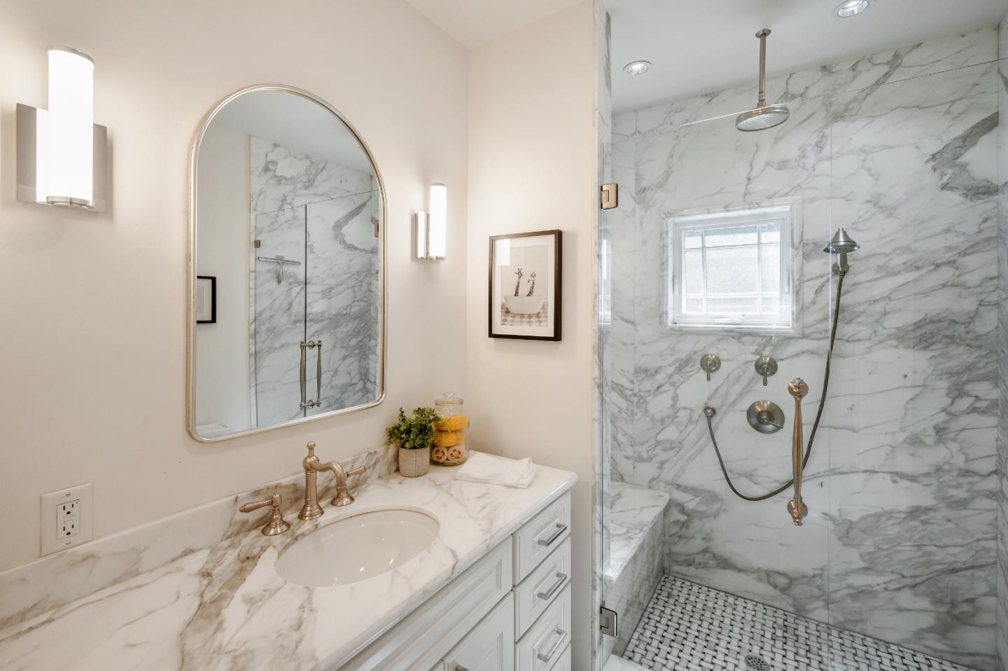 170 Warren Road San Mateo, CA 94401 - Photo 43 of 56 a bathroom with a granite countertop sink a mirror a glass door a shower and a mirror