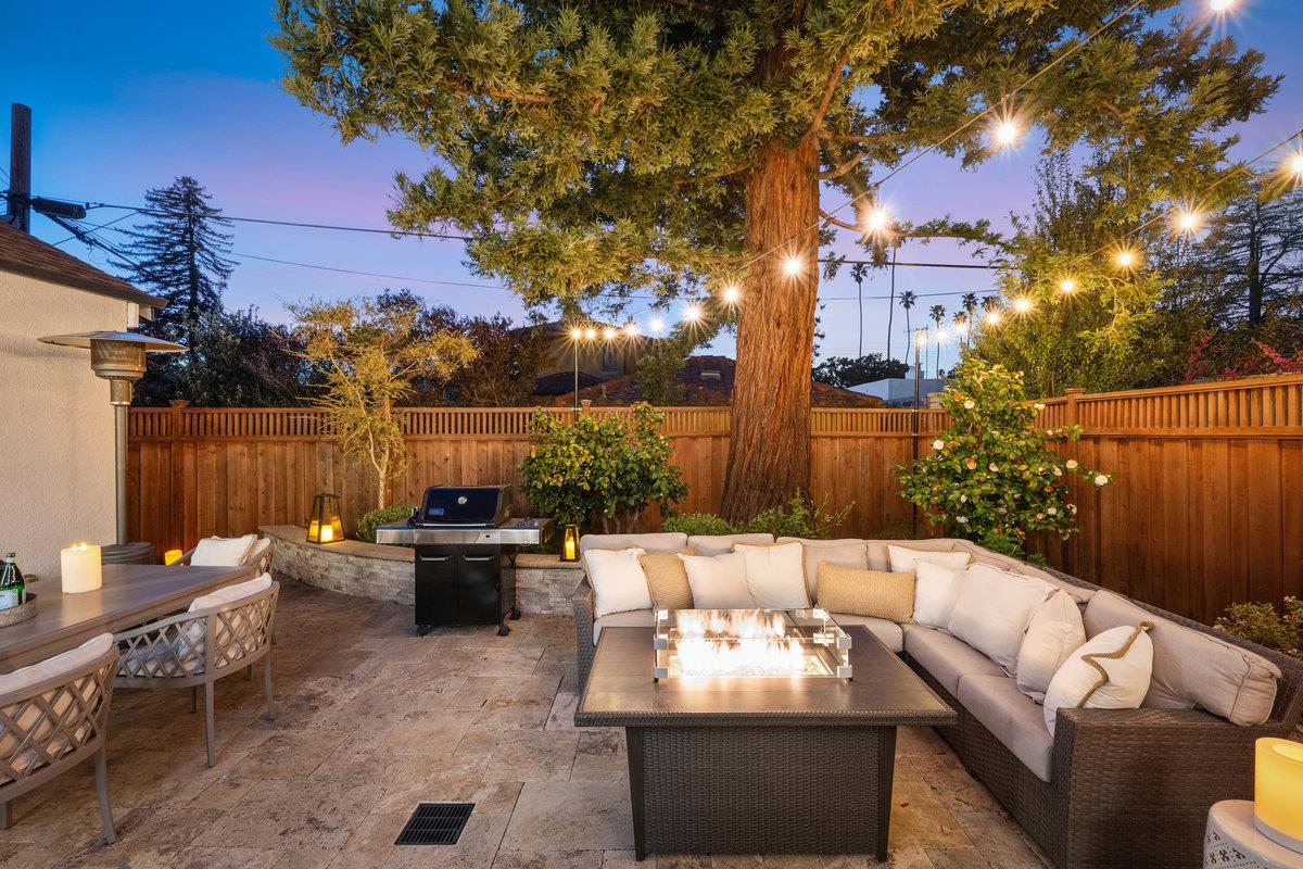 170 Warren Road San Mateo, CA 94401 - Photo 9 of 56 a backyard of a house with outdoor seating