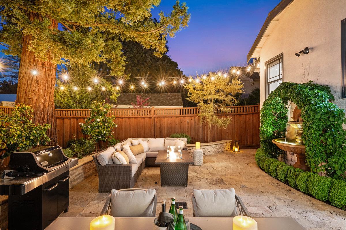 170 Warren Road San Mateo, CA 94401 - Photo 10 of 56 a view of a patio with couches table and chairs and potted plants
