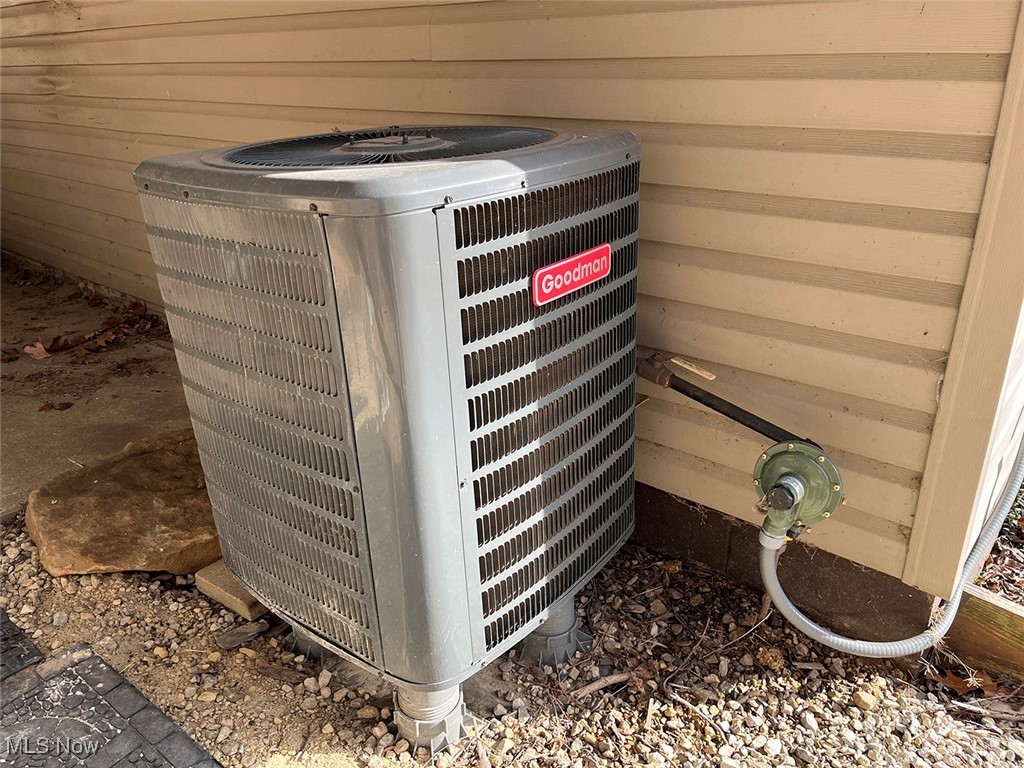 5295 Deer Road Southwest Bowerston, OH 44695 - Photo 33 of 39 Exterior details with cooling unit