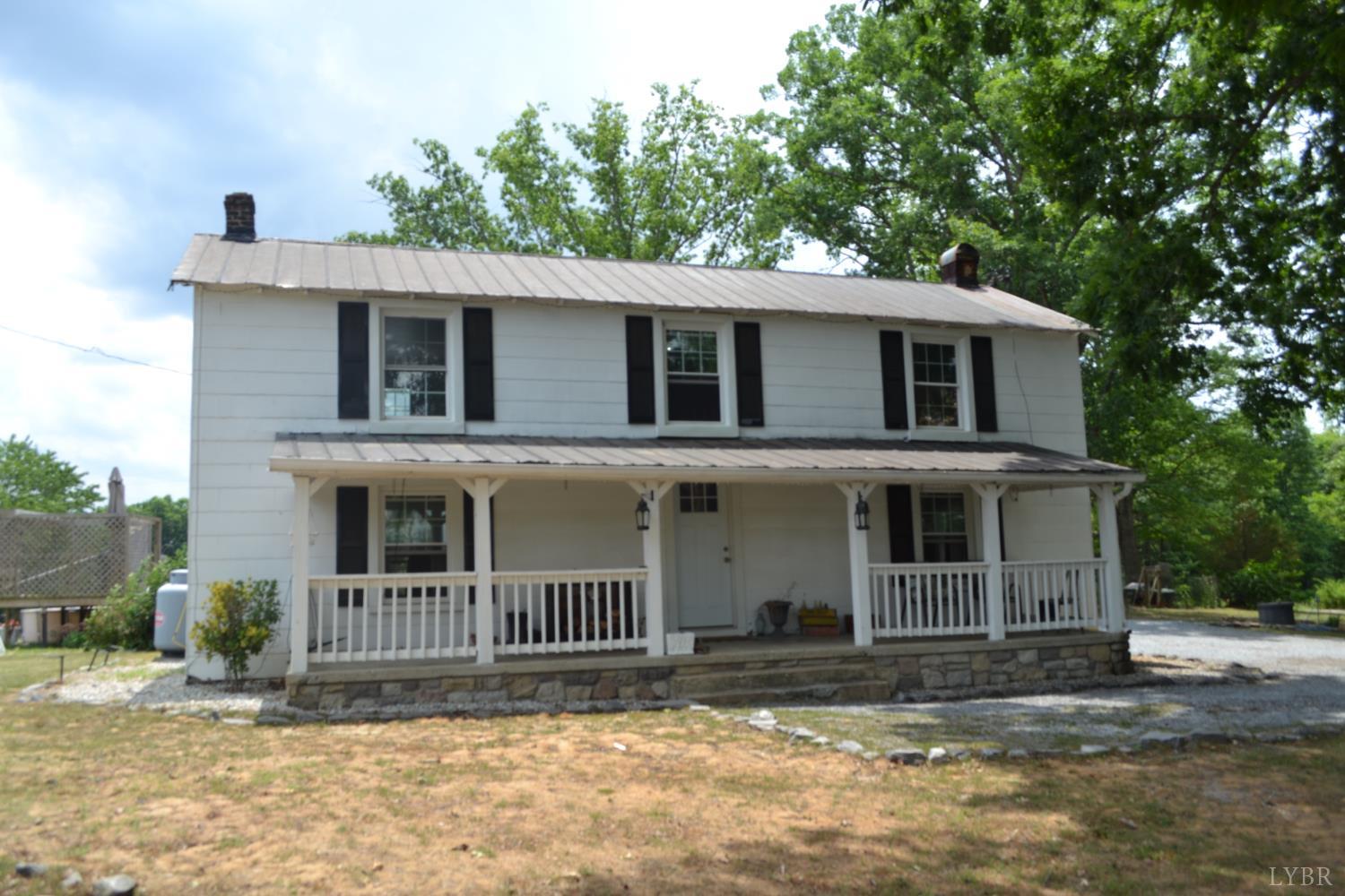 6387 Red House Road Rustburg, VA 24588 - Photo 38 of 38 a view of a house with a yard and large tree