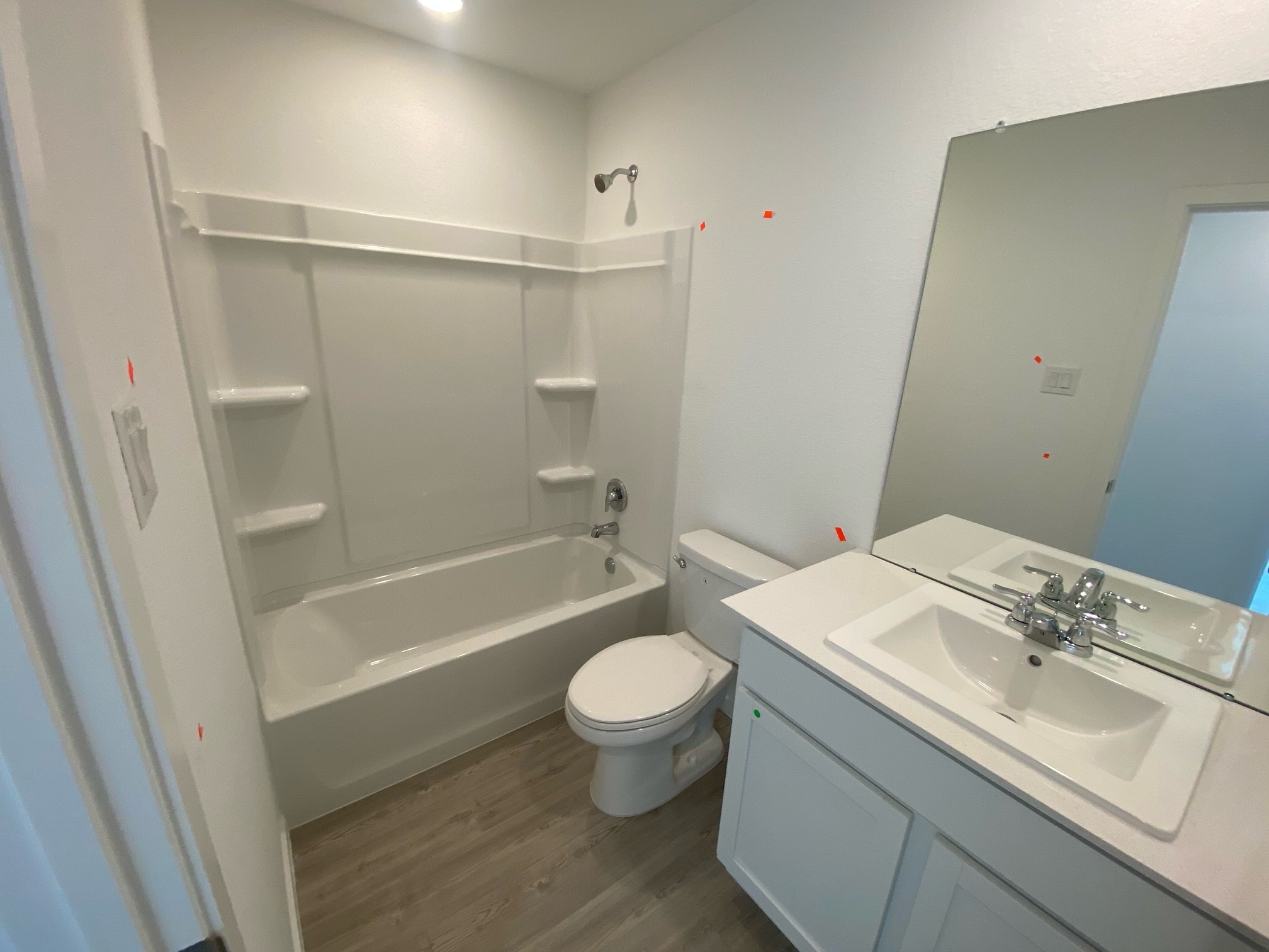 5432 Bear Run Bryan, TX 77807 - Photo 19 of 36 a bathroom with a sink a toilet and a bathtub