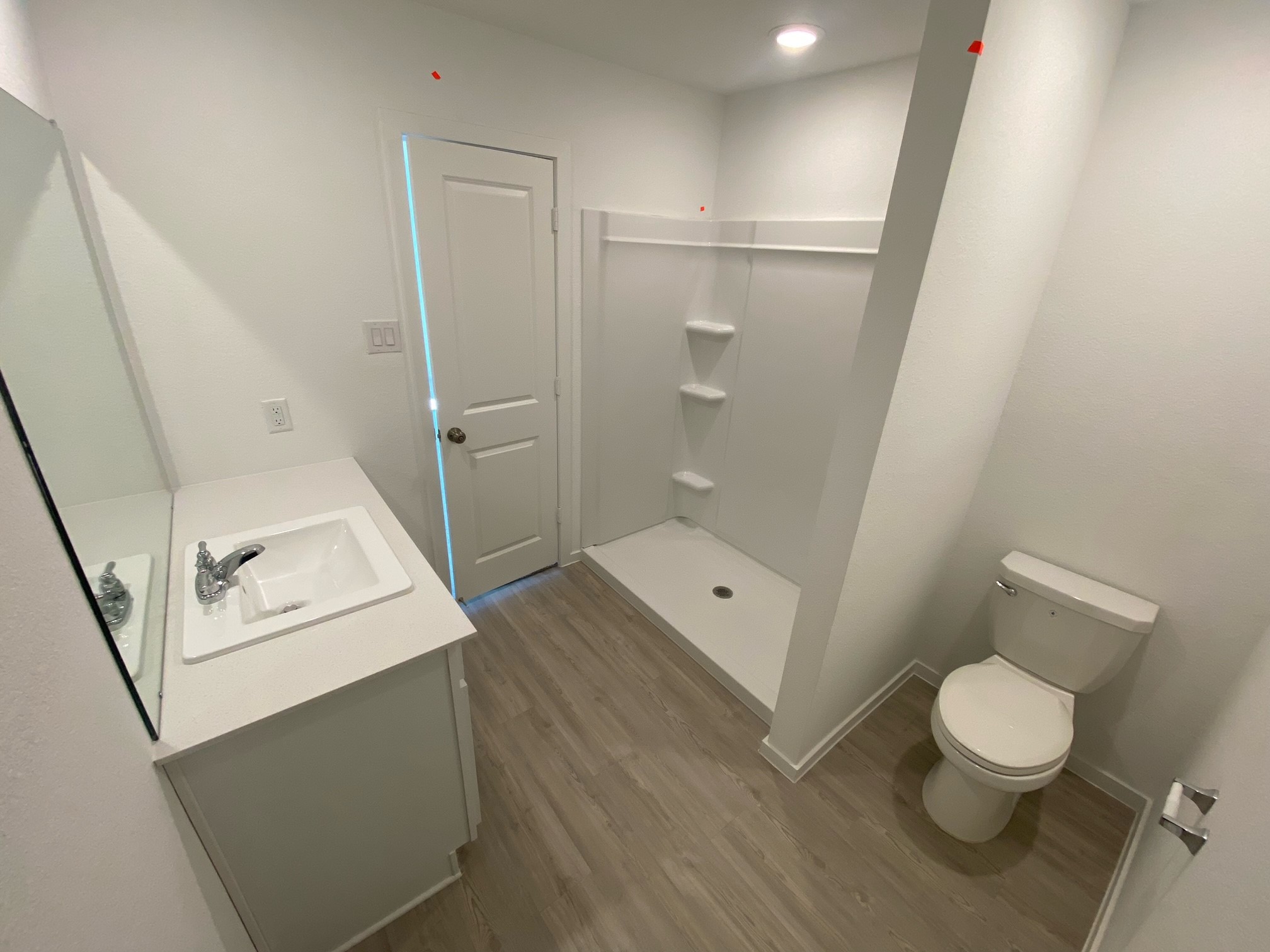 5432 Bear Run Bryan, TX 77807 - Photo 16 of 36 a bathroom with a sink a toilet and shower