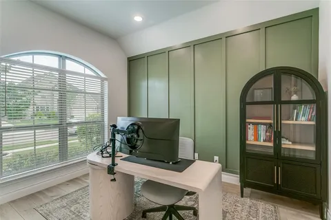 a workspace with furniture and a window