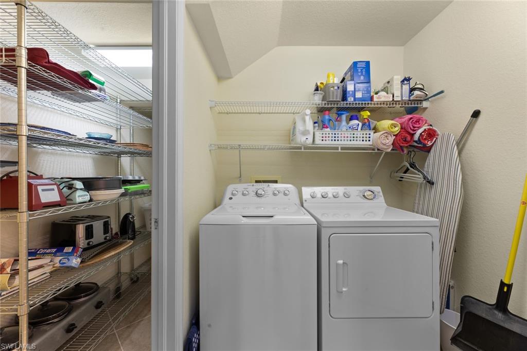 19724 Villa Rosa Loop Estero, FL 33967 - Photo 36 of 50 a utility room with dryer and washer