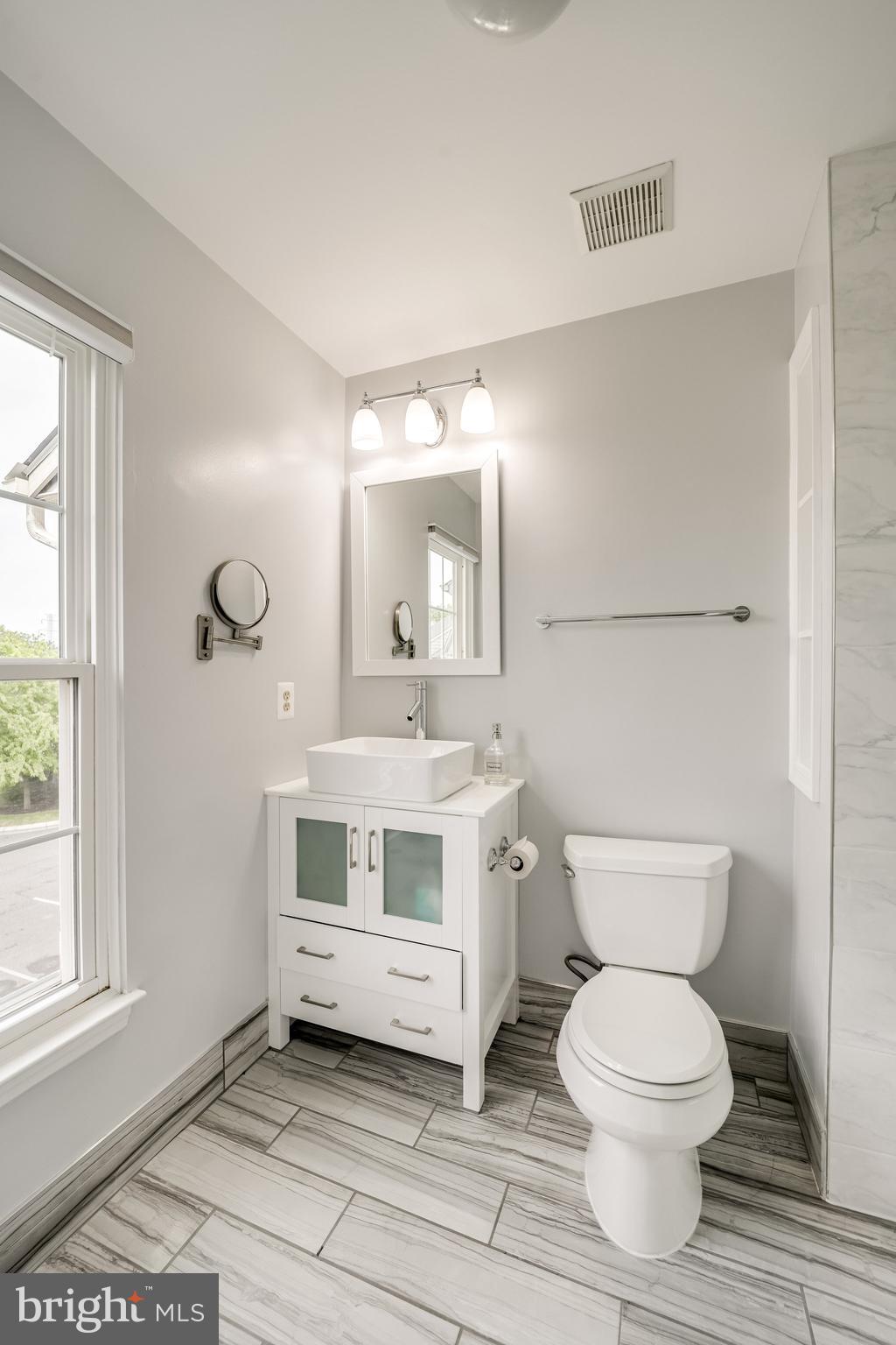 6007 Bingley Road Alexandria, VA 22315 - Photo 35 of 70 Beautiful modern vanity and tile flooring
