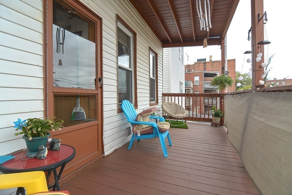 110 Everett Street Boston, MA 02128 - Photo 32 of 41 a view of a balcony with chairs