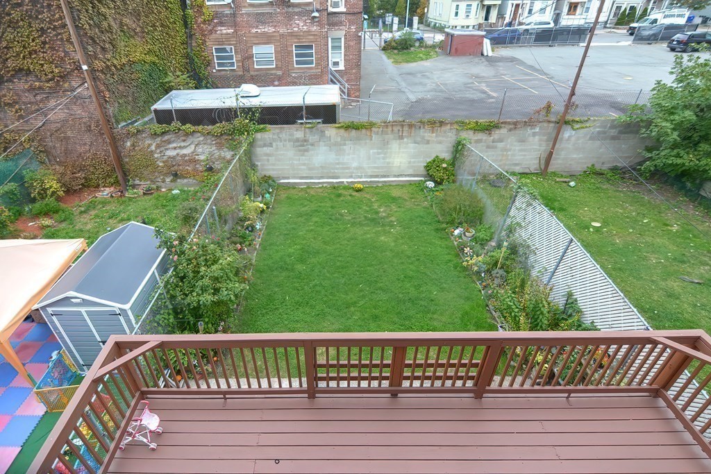 110 Everett Street Boston, MA 02128 - Photo 39 of 41 a view of a backyard with sitting area