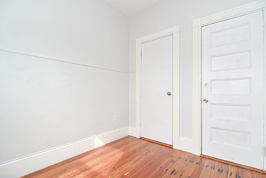110 Everett Street Boston, MA 02128 - Photo 7 of 41 a view of small space with wooden floor