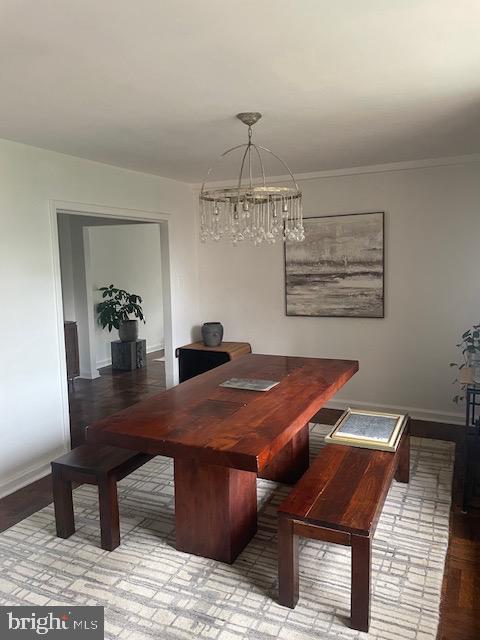 40 Old Lancaster Road, Unit 512 Merion Station, PA 19066 - Photo 15 of 60 a dining room with a table and chairs