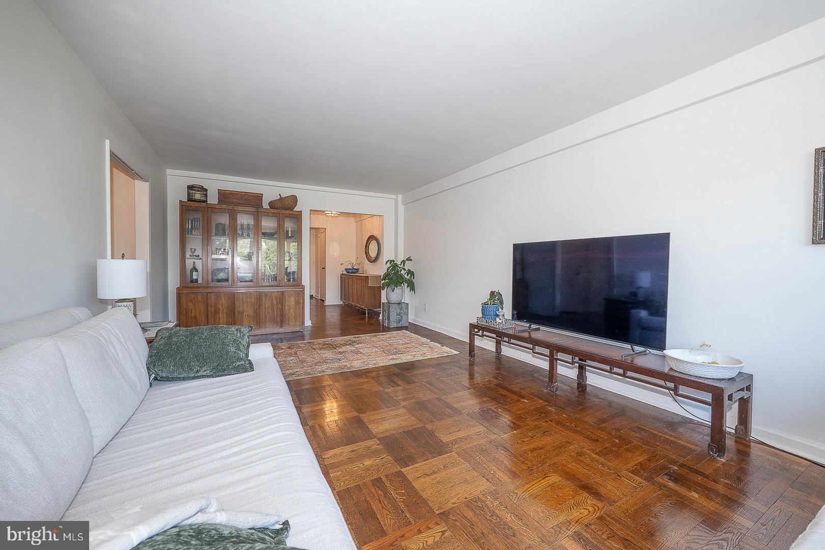 40 Old Lancaster Road, Unit 512 Merion Station, PA 19066 - Photo 22 of 60 a living room with furniture and a flat screen tv