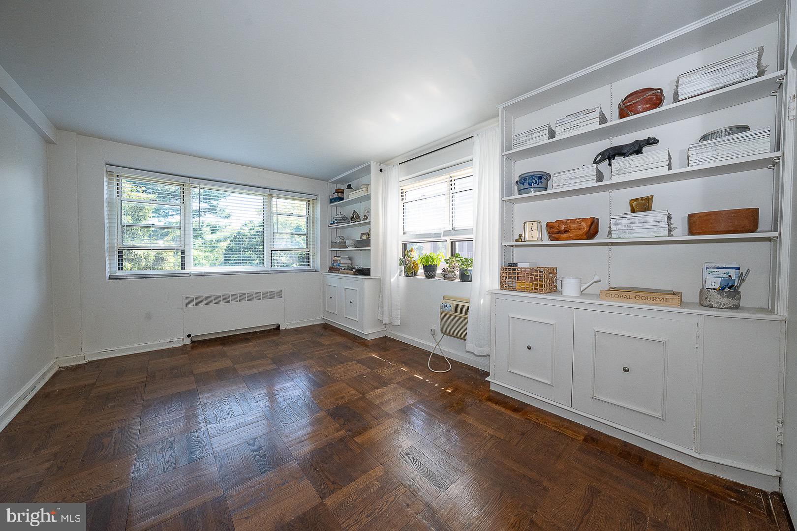 40 Old Lancaster Road, Unit 512 Merion Station, PA 19066 - Photo 32 of 60 a view of a kitchen with wooden floor and white walls