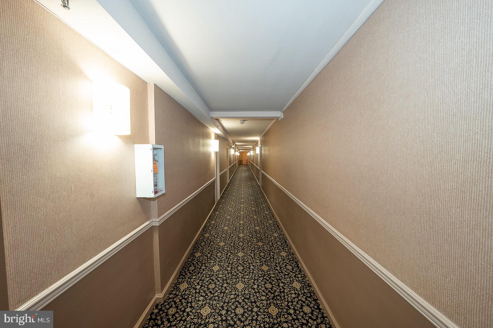 40 Old Lancaster Road, Unit 512 Merion Station, PA 19066 - Photo 35 of 60 a view of a hallway with wooden floor