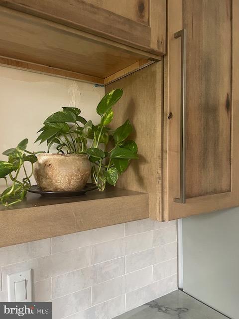 40 Old Lancaster Road, Unit 512 Merion Station, PA 19066 - Photo 4 of 60 a potted plant sitting on the side of a window