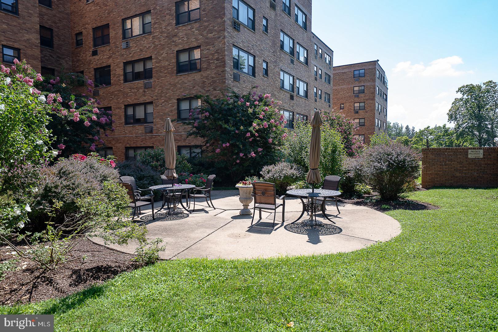 40 Old Lancaster Road, Unit 512 Merion Station, PA 19066 - Photo 47 of 60 a view of a patio with a table and chairs