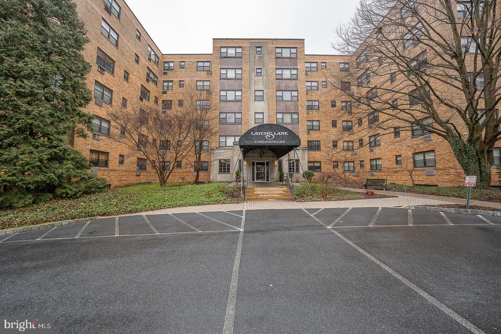 40 Old Lancaster Road, Unit 512 Merion Station, PA 19066 - Photo 56 of 60 a view of a building with a outdoor space