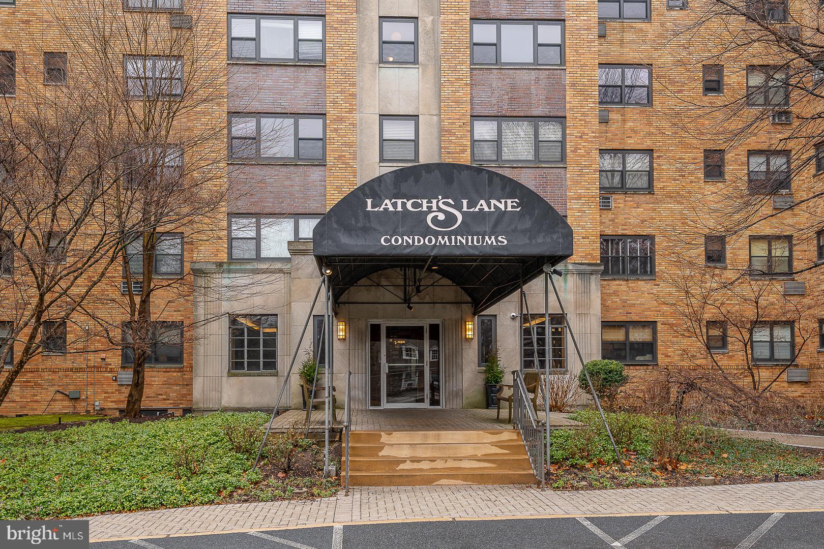 40 Old Lancaster Road, Unit 512 Merion Station, PA 19066 - Photo 58 of 60 a view of a brick building with many windows