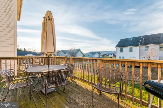 a view of a balcony with chairs
