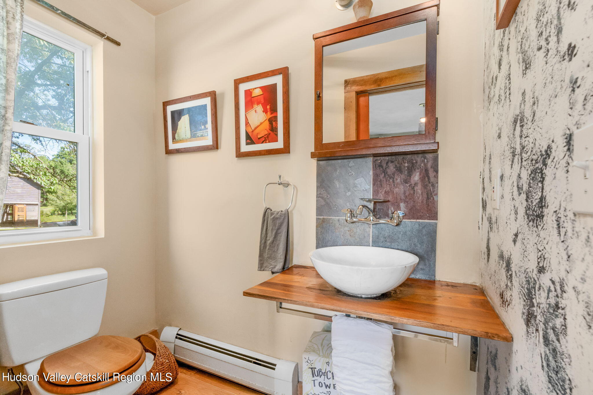 67 Jaycox Road Medusa, NY 12120 - Photo 23 of 36 a bathroom with a toilet and a sink