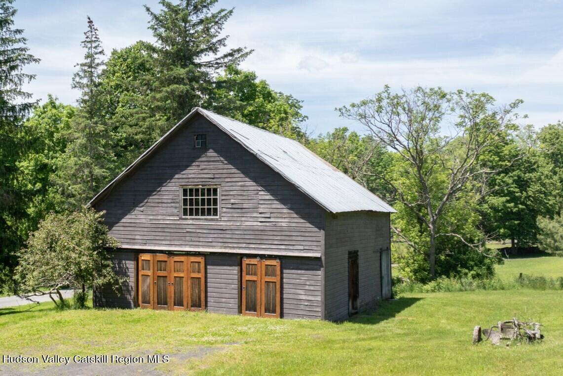 67 Jaycox Road Medusa, NY 12120 - Photo 27 of 36 a front view of a house with garden