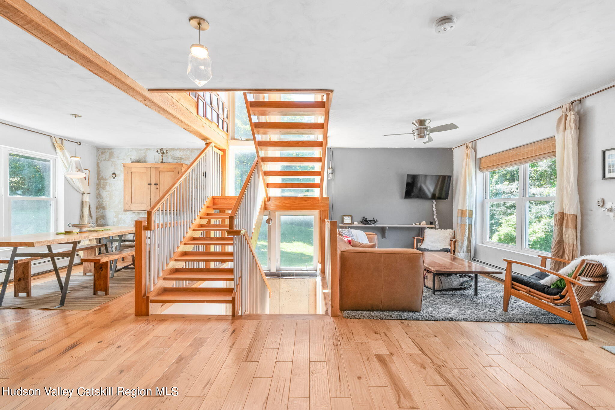 67 Jaycox Road Medusa, NY 12120 - Photo 8 of 36 a living room with furniture and a wooden floor
