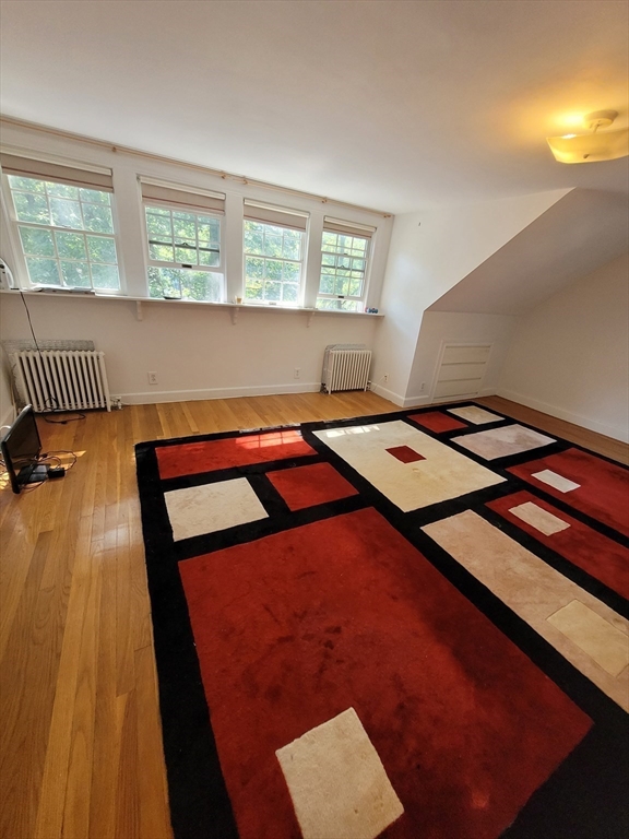 70 Craftsland Road Brookline, MA 02467 - Photo 12 of 16 a bedroom with a bed and a window in it