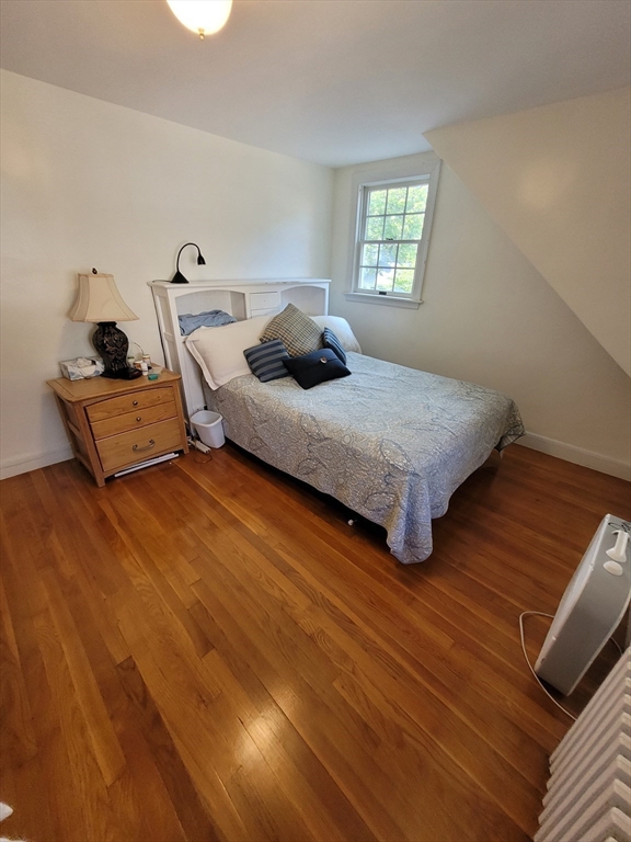 70 Craftsland Road Brookline, MA 02467 - Photo 14 of 16 a bedroom with a bed and window