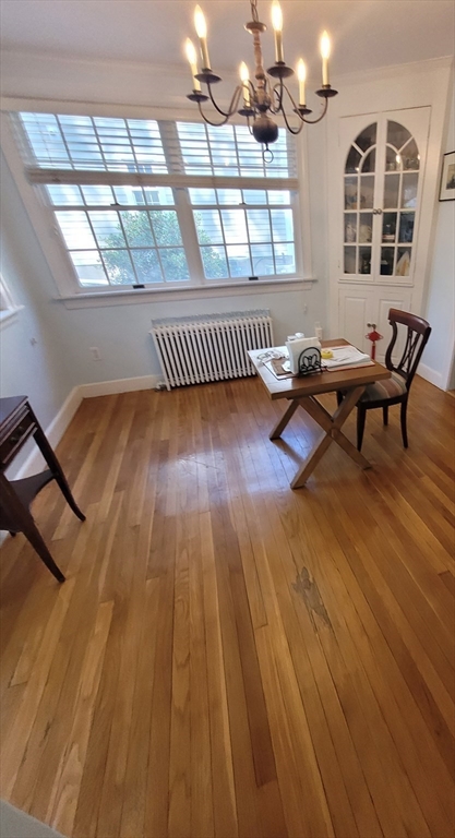 70 Craftsland Road Brookline, MA 02467 - Photo 6 of 16 a living room with furniture and a wooden floor