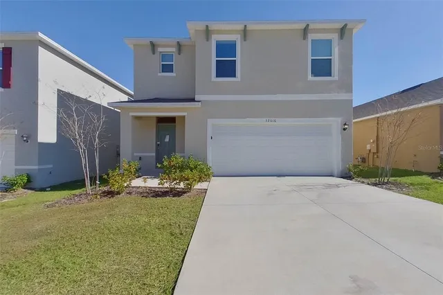 a front view of house with yard