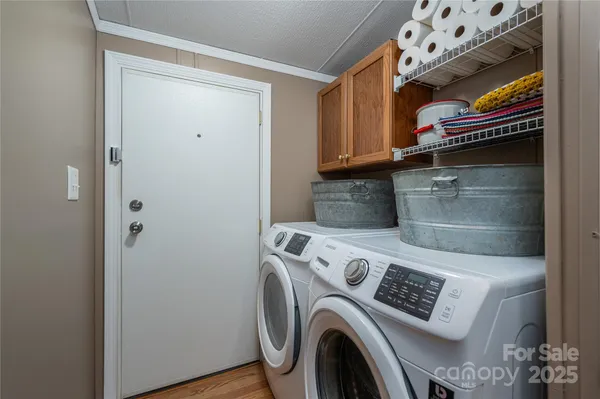 a utility room with dryer and washer