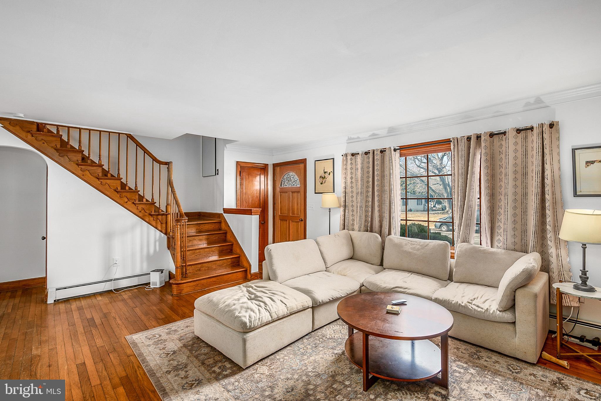 29510 Hawkes Hill Road Easton, MD 21601 - Photo 2 of 32 a living room with furniture and wooden floor
