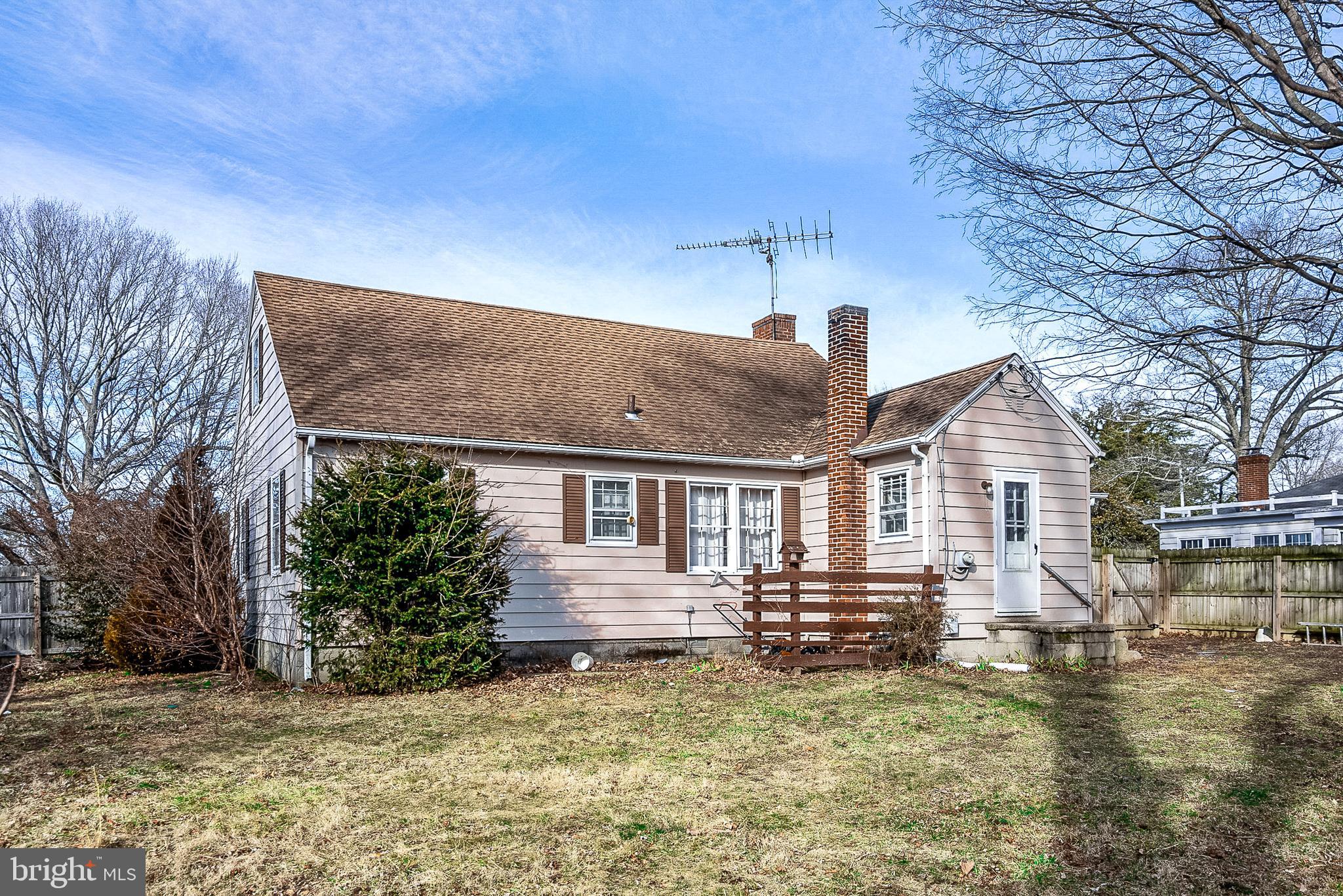 29510 Hawkes Hill Road Easton, MD 21601 - Photo 26 of 32 a front view of a house with a yard