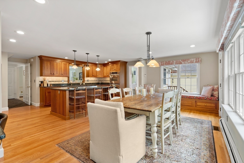 58 High Ridge Road Boxford, MA 01921 - Photo 12 of 40 a view of a dining room with furniture window and wooden floor