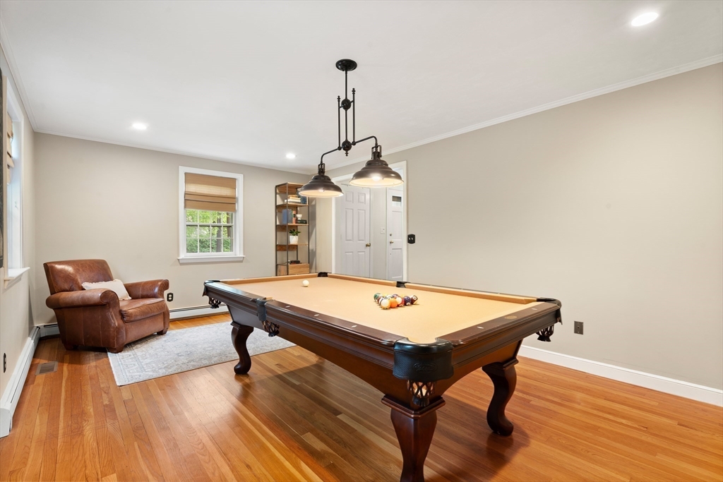 58 High Ridge Road Boxford, MA 01921 - Photo 16 of 40 a room with furniture and wooden floor