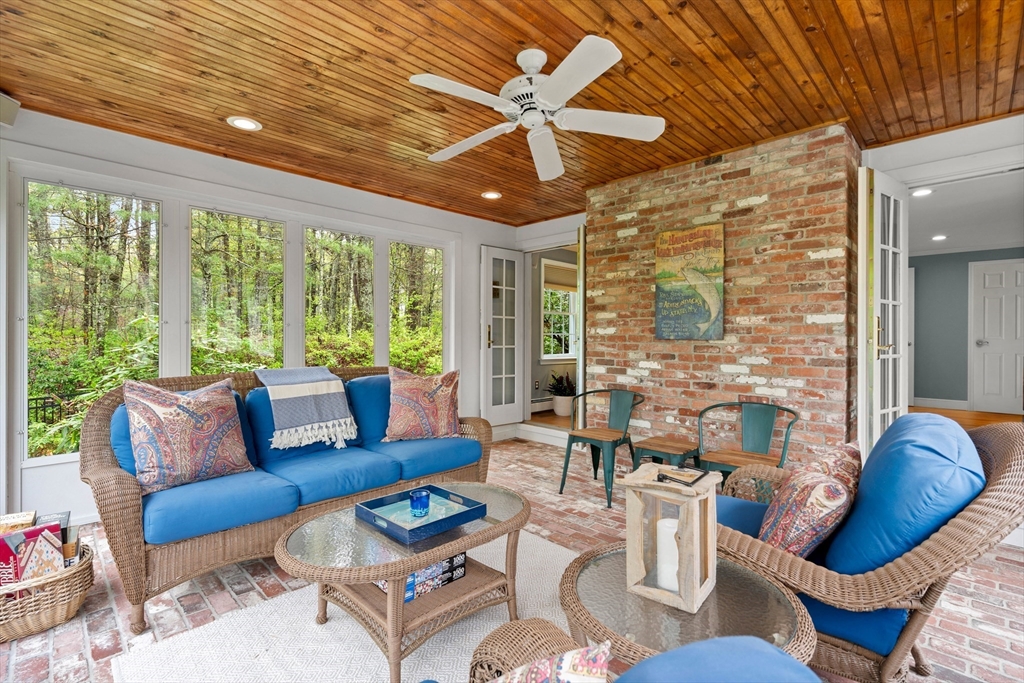 58 High Ridge Road Boxford, MA 01921 - Photo 17 of 40 a living room with furniture and a large window