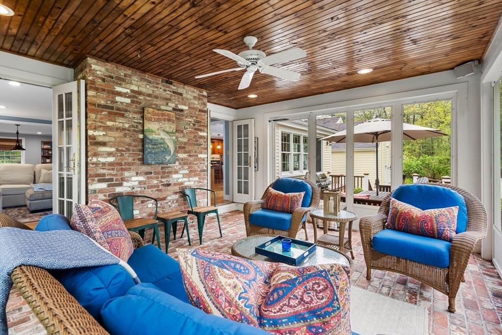 58 High Ridge Road Boxford, MA 01921 - Photo 18 of 40 a living room with furniture floor to ceiling window and wooden floor