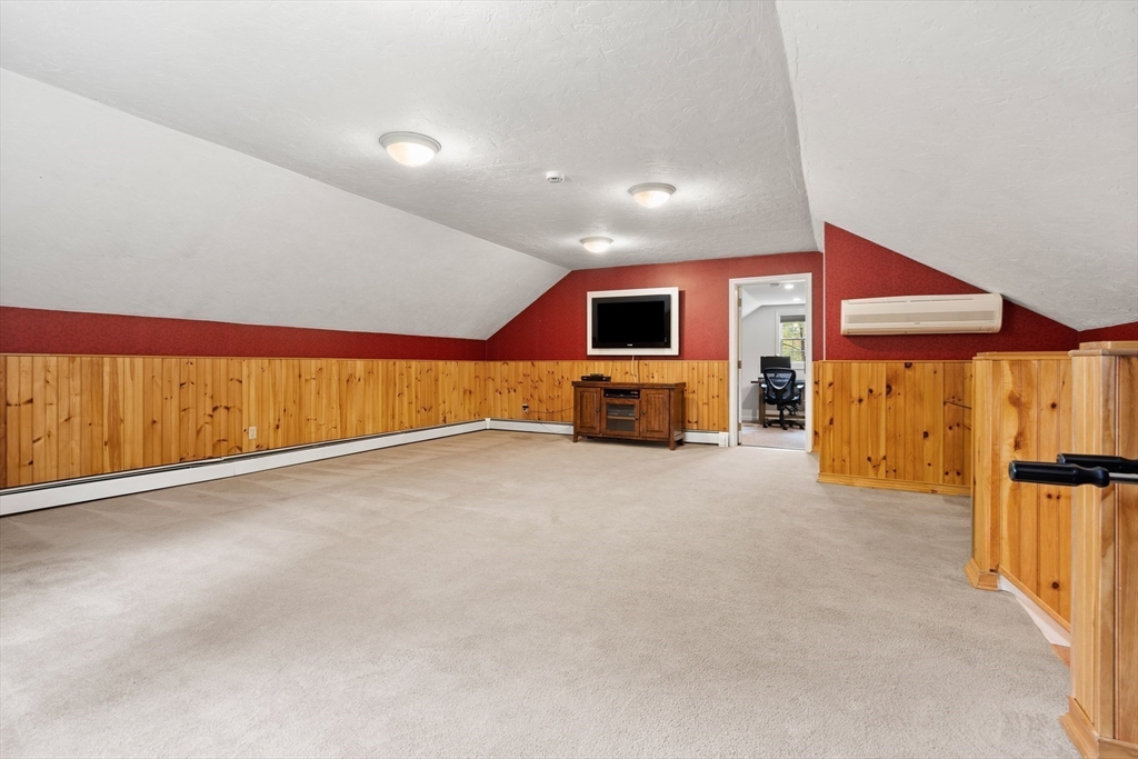 58 High Ridge Road Boxford, MA 01921 - Photo 22 of 40 a view of an empty room with a fireplace