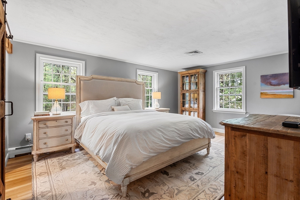 58 High Ridge Road Boxford, MA 01921 - Photo 26 of 40 a bedroom with a bed and a window